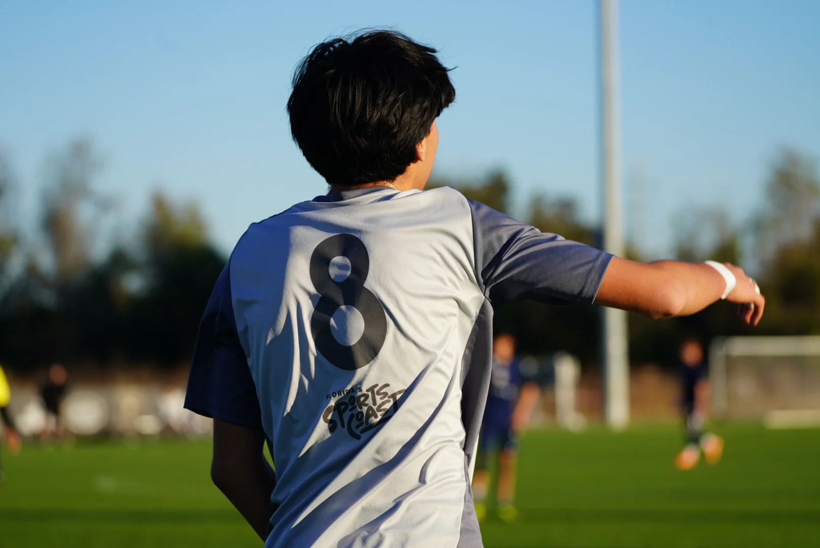 Number eight soccer player directing the play