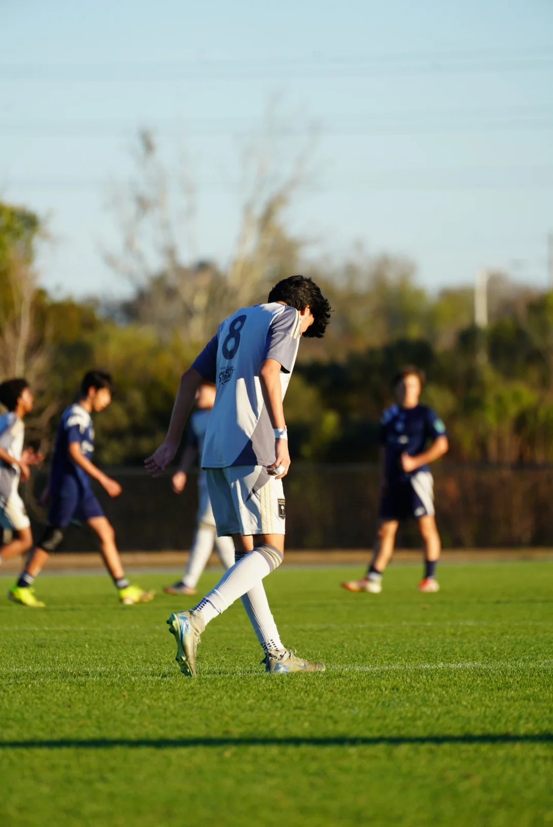 Soccer player moving through a wide field