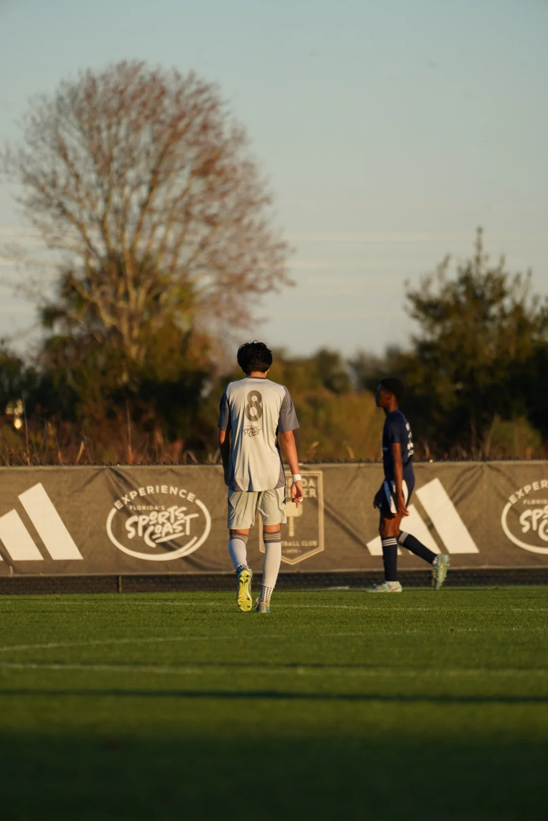 Soccer player isolated against the far field
